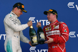 Kimi Raikkonen, Ferrari and Race winner Valtteri Bottas, Mercedes AMG F1