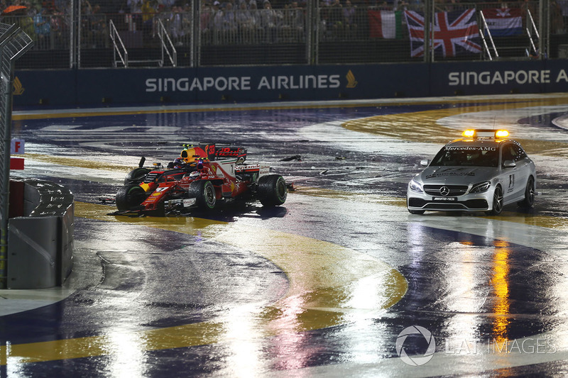 The crashed cars of Max Verstappen, Red Bull Racing RB13 and Kimi Raikkonen, Ferrari SF70H and Medical car