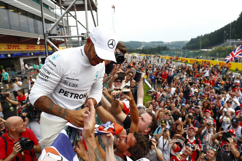 Race winner Lewis Hamilton, Mercedes AMG F1, celebrates with fans after the race