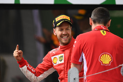 Race winner Sebastian Vettel, Ferrari celebrates on the podium