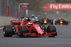 Sebastian Vettel, Ferrari SF71H leads at the start of the race