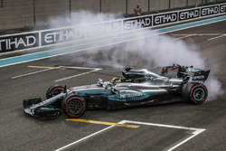 Lewis Hamilton, Mercedes-Benz F1 W08 performs donuts in parc ferme