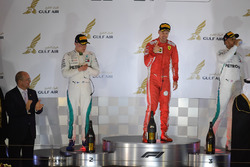 Sebastian Vettel, Ferrari, Valtteri Bottas, Mercedes-AMG F1 and Lewis Hamilton, Mercedes-AMG F1 celebrate on the podium