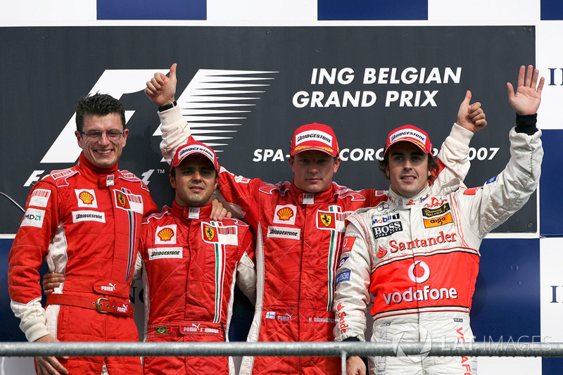 Podium: Chris Dyer, Ferrari race engineer, second placed Felipe Massa, Ferrari, race winner Kimi Raikkonen, Ferrari, and third placed Fernando Alonso, McLaren