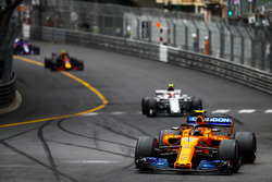 Stoffel Vandoorne, McLaren MCL33, leads Charles Leclerc, Sauber C37, and Max Verstappen, Red Bull Racing RB14