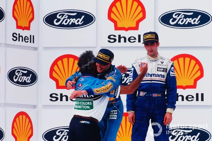Michael Schumacher, Benetton Ford with Flavio Briatore, Benetton team manager and Damon Hill, Williams Renault