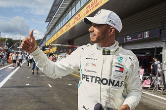 Pole man Lewis Hamilton, Mercedes AMG F1, gives a thumbs up to fans