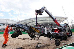 The McLaren MP4-31 of Fernando Alonso, McLaren is removed from the gravel trap after his race stoppi