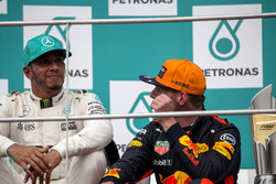 Lewis Hamilton, Mercedes AMG F1 and Max Verstappen, Red Bull Racing celebrates on the podium