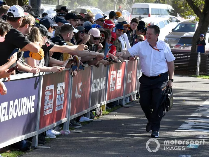 Zak Brown, Executive Director, McLaren signs autographs for fans.