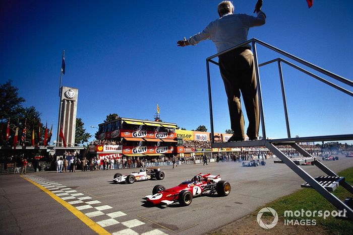 Ganador de la pole Jacky Ickx, Ferrari 312B junto a Pedro Rodríguez, BRM P153 al inicio de la carrera