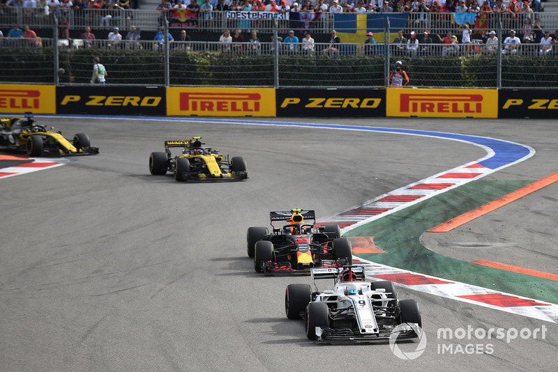 Marcus Ericsson, Sauber C37, Max Verstappen, Red Bull Racing RB14 and Carlos Sainz Jr., Renault Sport F1 Team R.S. 18