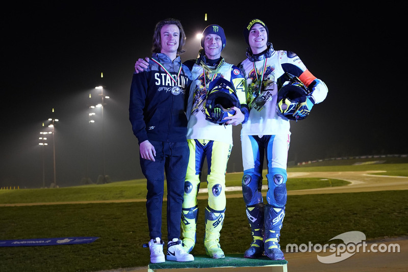 Valentino Rossi celebrating his victory with Nicolo Bulega and Lorenzo Baldassarri