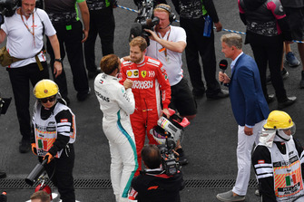 Lewis Hamilton, Mercedes AMG F1 and Sebastian Vettel, Ferrari celebrate in Parc Ferme