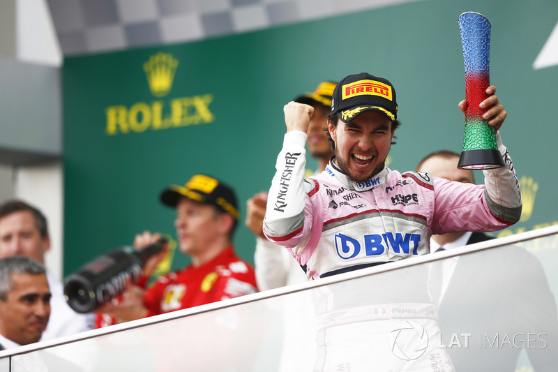 Third place Sergio Perez, Force India, celebrates on the podium