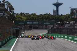 Valtteri Bottas, Mercedes-Benz F1 W08 and Sebastian Vettel, Ferrari SF70H battle for the lead at th