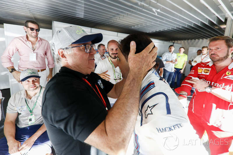 Felipe Massa, Williams, is embraced by his father after his final home grand prix