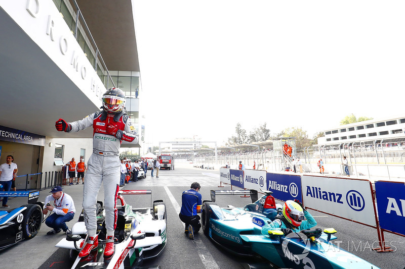 Daniel Abt, Audi Sport ABT Schaeffler, celebrates after winning the race as Oliver Turvey, NIO Formula E Team, climbs from his car