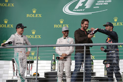 The podium (L to R): Nico Rosberg, Mercedes AMG F1, second; Lewis Hamilton, Mercedes AMG F1, race wi