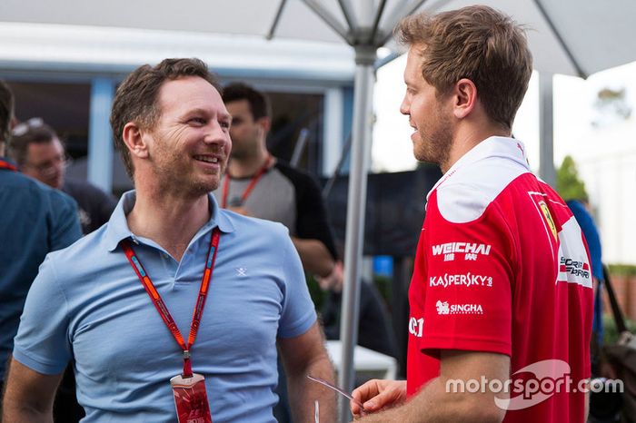 Christian Horner, Red Bull Racing director del equipo y Sebastian Vettel, Ferrari