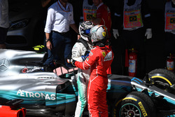 Valtteri Bottas, Mercedes AMG F1 and Sebastian Vettel, Ferrari celebrate in parc ferme