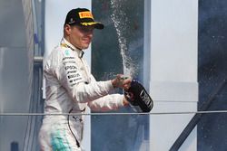 Second place Valtteri Bottas, Mercedes AMG F1 celebrates on the podium with the champagne