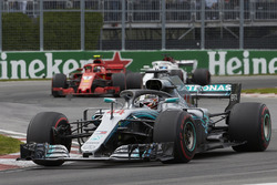 Lewis Hamilton, Mercedes AMG F1 W09, leads Kimi Raikkonen, Ferrari SF71H