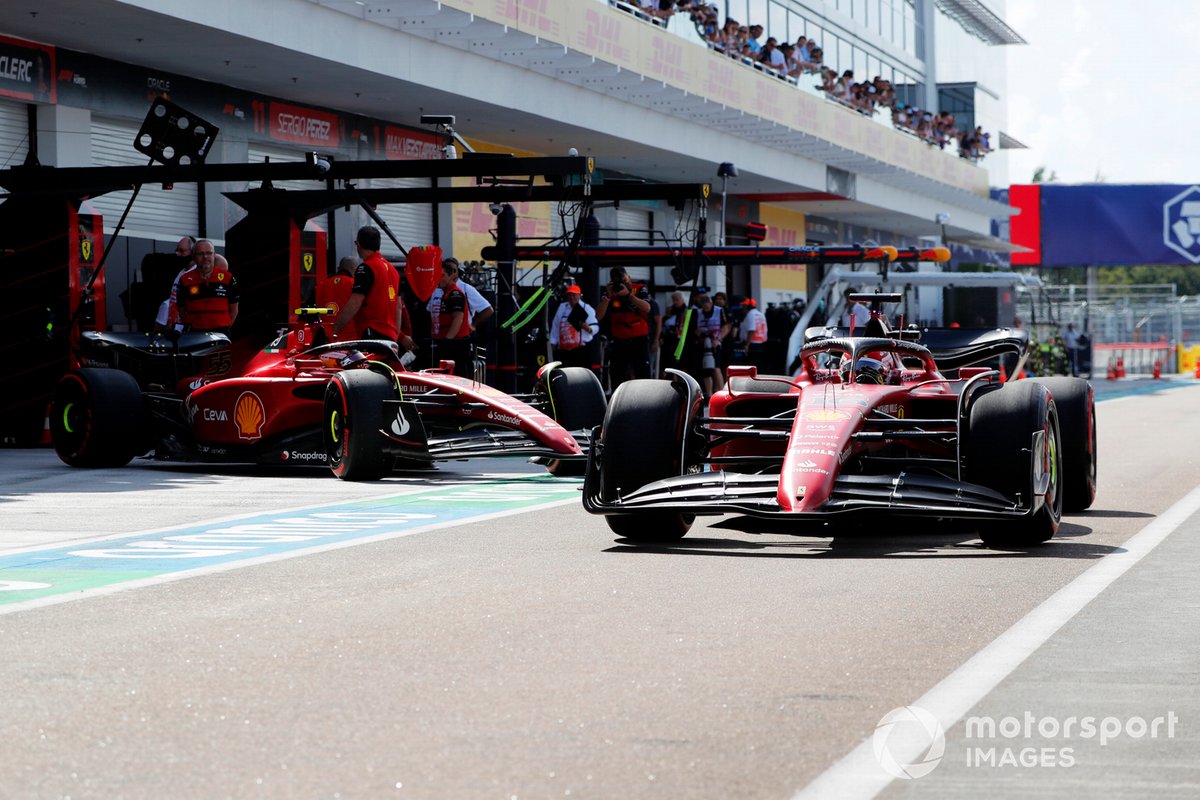 Charles Leclerc, Ferrari F1-75, Carlos Sainz, Ferrari F1-75, leave the garage