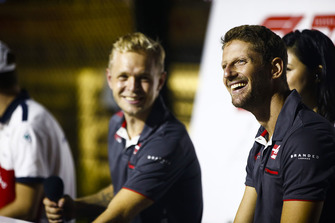 Romain Grosjean, Haas F1 Team, and Kevin Magnussen, Haas F1 Team, attend a fan event.