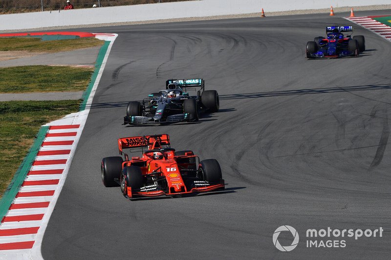Charles Leclerc, Ferrari SF90 leads Lewis Hamilton, Mercedes-AMG F1 W10