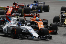 Lance Stroll, Williams FW40, Fernando Alonso, McLaren MCL32, Sebastian Vettel, Ferrari SF70H, Marcus Ericsson, Sauber C36, at the start