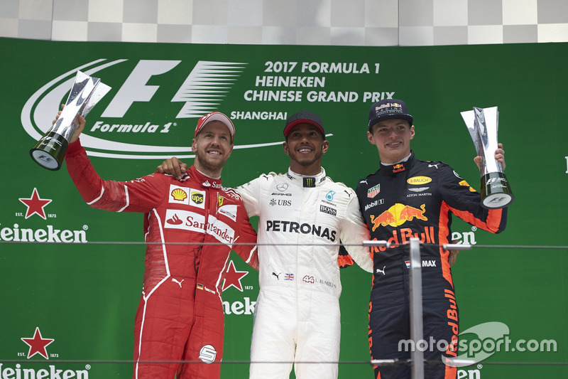 Podium: second place Sebastian Vettel, Ferrari, Aldo Costa, Engineering Director, Mercedes AMG, Race