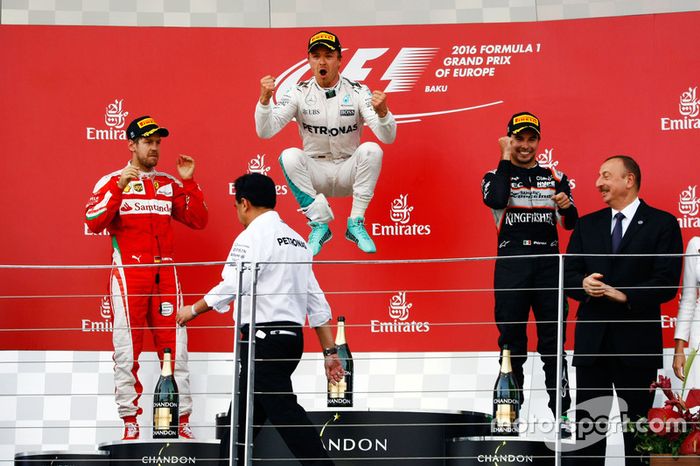 The podium (L to R): Sebastian Vettel, Ferrari, second; Nico Rosberg, Mercedes AMG F1, race winner; Sergio Perez, Sahara Force India F1, third