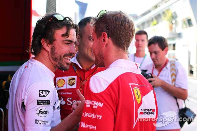 Fernando Alonso, McLaren Honda; Sebastian Vettel, Scuderia Ferrari