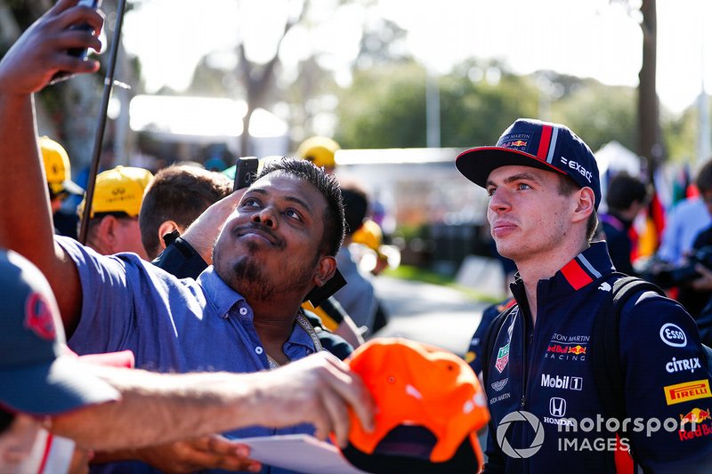 Max Verstappen, Red Bull Racing, takes a selfie with a fan