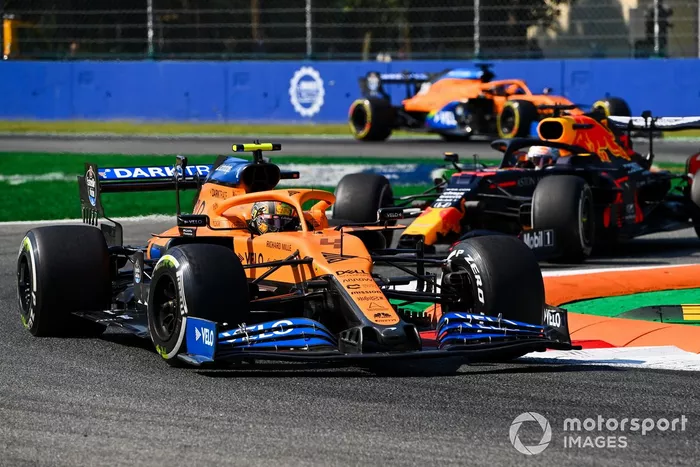 Lando Norris, McLaren MCL35, Max Verstappen, Red Bull Racing RB16, and Carlos Sainz Jr., McLaren MCL35