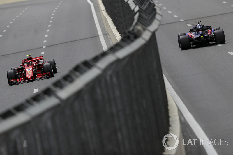 Kimi Raikkonen, Ferrari SF71H and Brendon Hartley, Scuderia Toro Rosso STR13