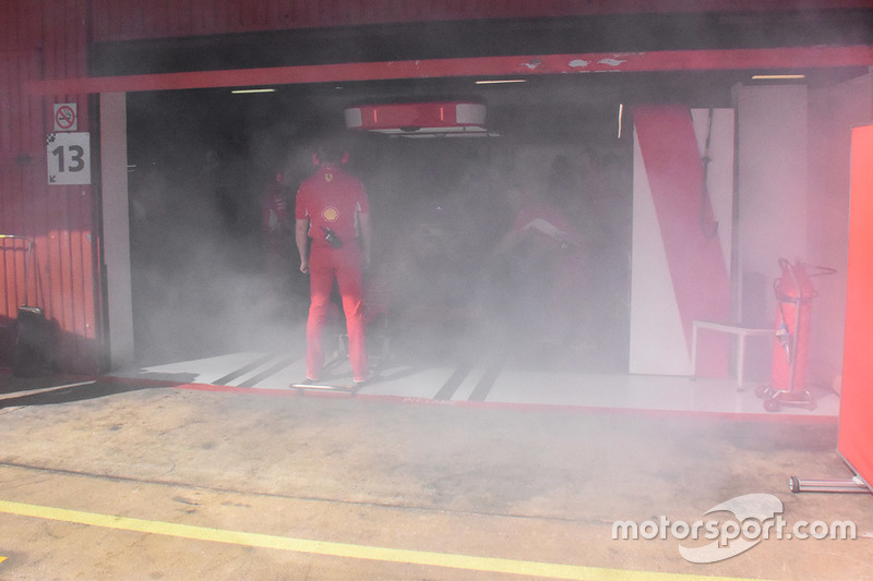 Ferrari garage with smoke