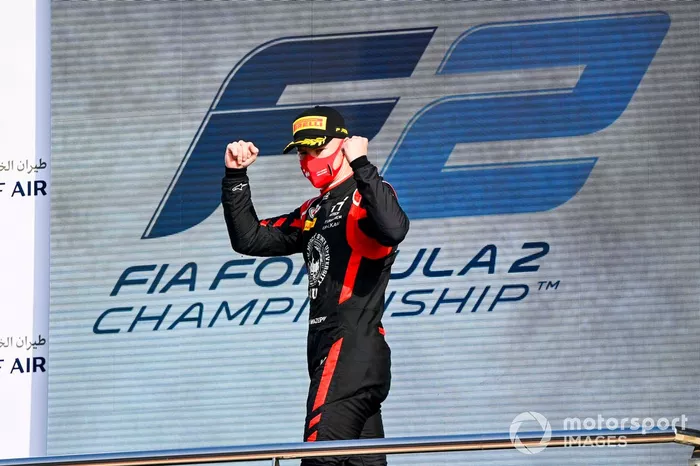 Nikita Mazepin, Hitech Grand Prix celebrate on the podium 