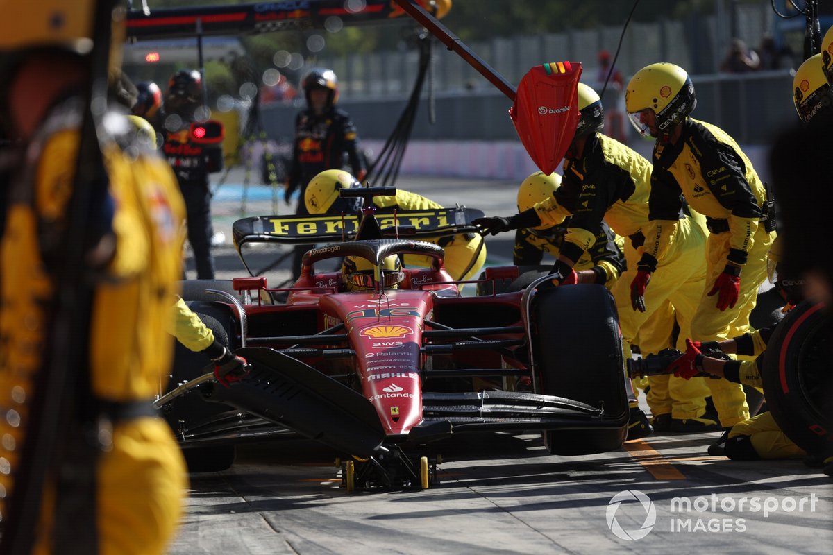 Charles Leclerc, Ferrari F1-75, makes his first pit stop under the VSC regime