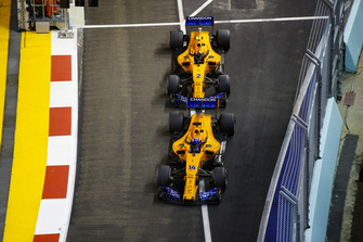 Fernando Alonso, McLaren MCL33, leads Stoffel Vandoorne, McLaren MCL33
