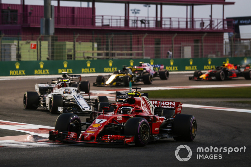 Kimi Raikkonen, Ferrari SF71H, leads Charles Leclerc, Sauber C37, Romain Grosjean, Haas F1 Team VF-18, and Nico Hulkenberg, Renault Sport F1 Team R.S. 18, and the remainder of the field at the start