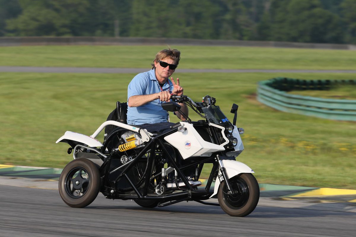 Rainey also uses a battery-powered trike that fits his wheelchair
