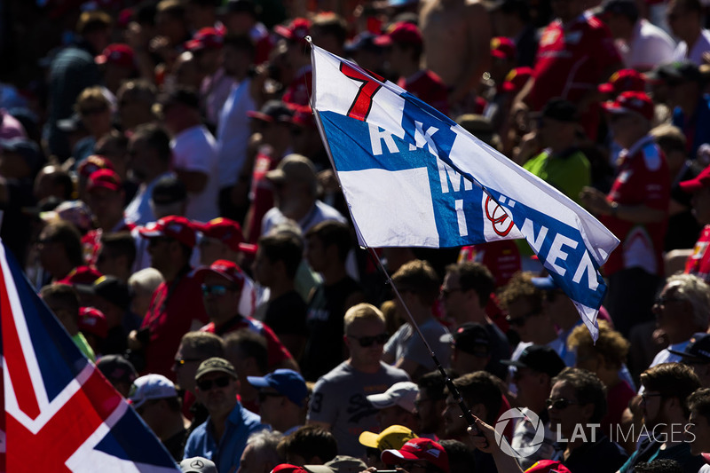 A flag in support of Kimi Raikkonen, Ferrari, in the crowd