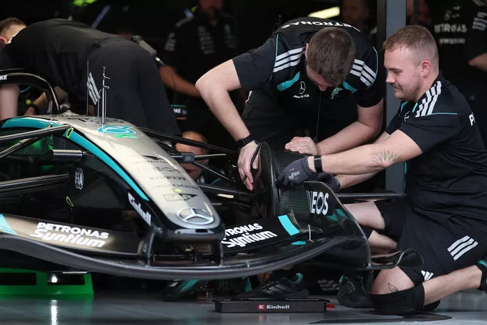 Mercedes mechanics at work 