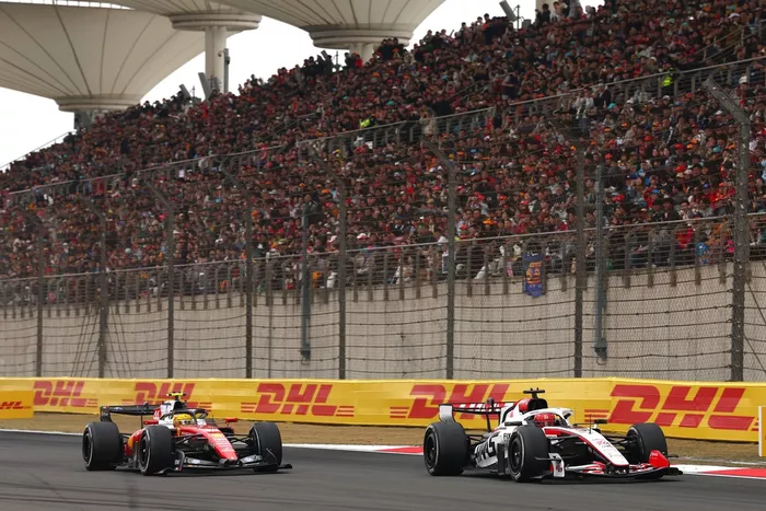 Lewis Hamilton, Ferrari, Esteban Ocon, Haas F1 Team