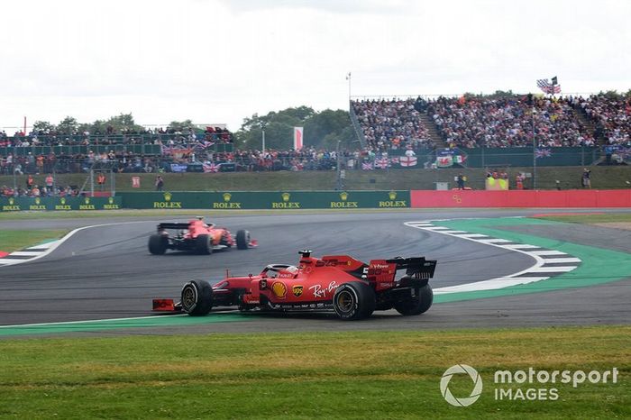 Sebastian Vettel, Ferrari SF90 after running into the back of Max Verstappen, Red Bull Racing RB15 