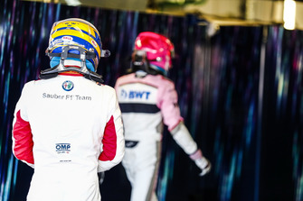 Marcus Ericsson, Sauber, follows Esteban Ocon, Racing Point Force India