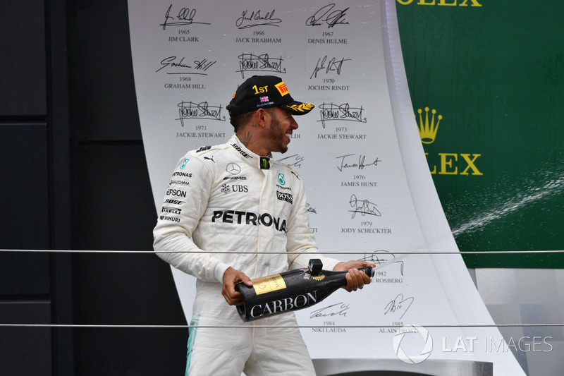 Lewis Hamilton, Mercedes AMG F1 celebrates on the podium, the champagne
