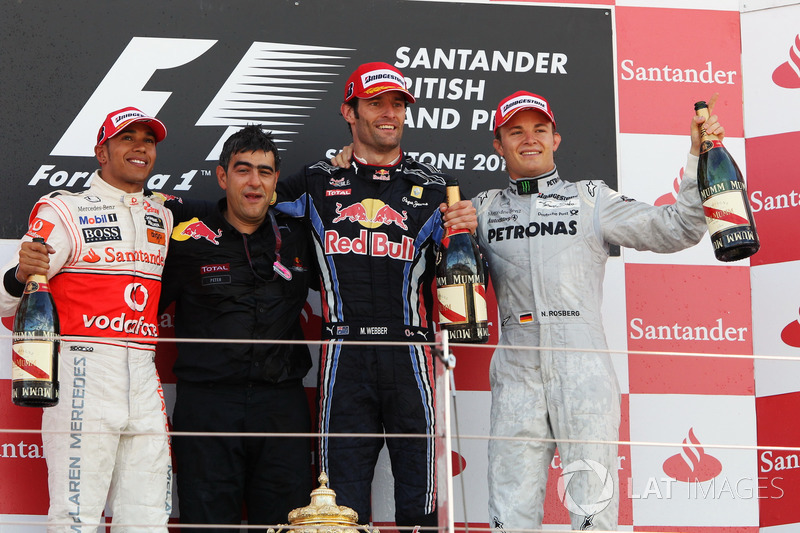 Podium: second place Lewis Hamilton, McLaren, Peter Prodromou, Red Bull Racing Head of Aerodynamics, Race winner Mark Webber, Red Bull Racing, third place Nico Rosberg, Mercedes GP